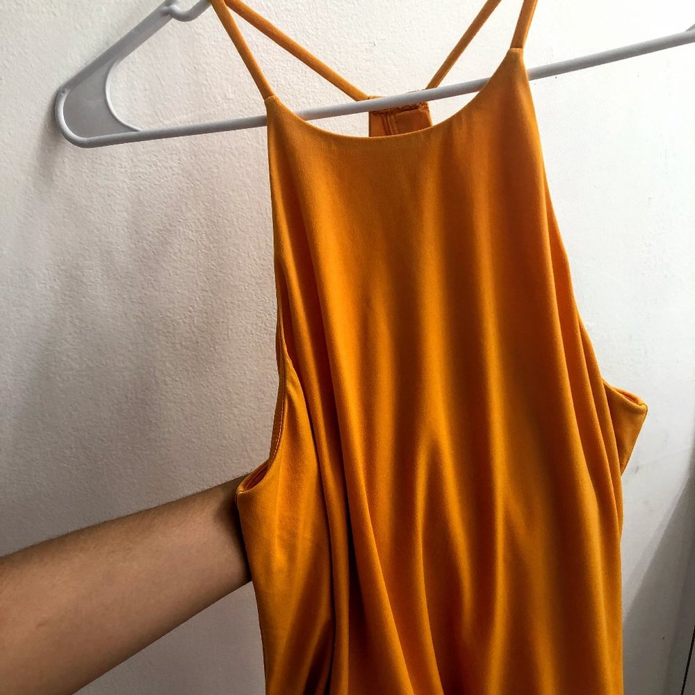 Yellow sleeveless blouse
